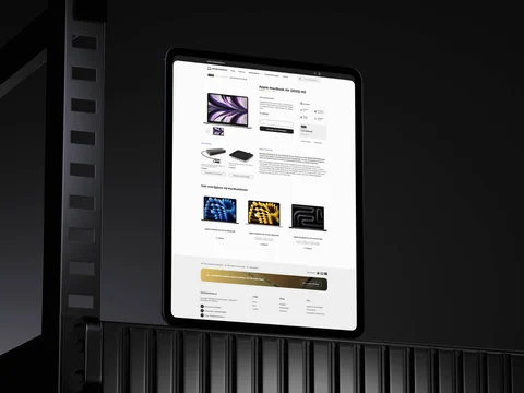 Tablet met een MacBook-productpagina, specificaties en gerelateerde producten.